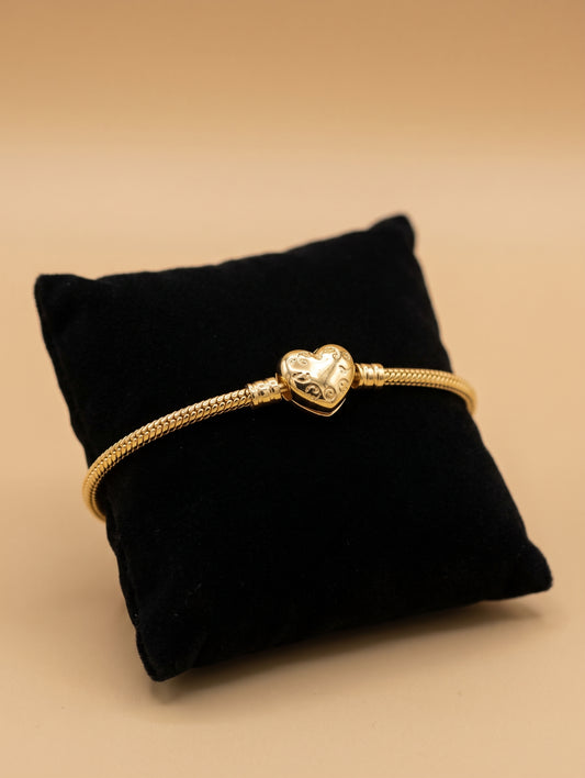 Pulsera pand0ra corazon dorada