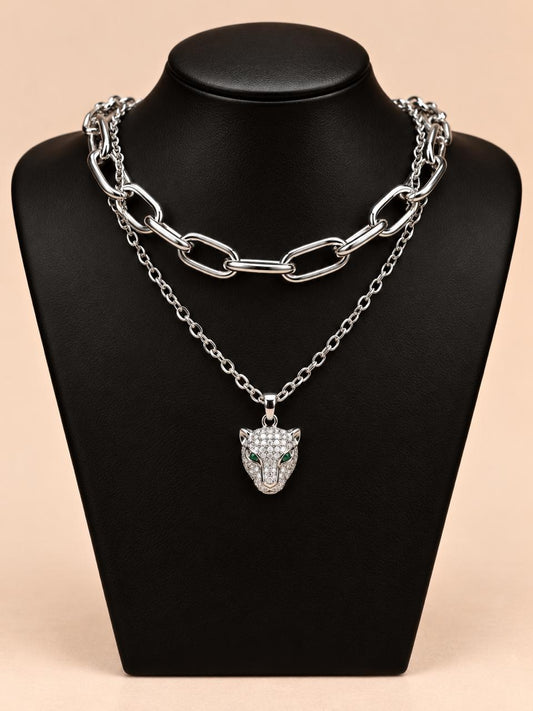 Collar doble plateado con dije cabeza de felino
